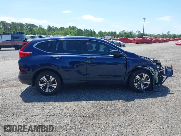 2019 Honda CR-V LX with VIN 2HKRW5H39KH400453, listed as a IAAI auction lot 40041024 with 76,932 mi miles and . Bid and sale history available at carsss.com. Image 14.