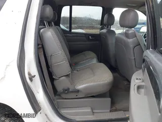 2004 GMC Envoy XUV SLE with VIN 1GKES12S846143483, listed as a IAAI auction lot 41500608 with 242,926 mi miles. Bid and sale history available at carsss.com. Image 8.