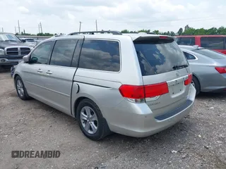 2009 Honda Odyssey Touring z VIN 5FNRL38949B002092, wystawiony jako IAAI lot #42072003 z przebiegiem Nie podano mil oraz . Historia ofert i sprzedaży dostępna na DreamBid. Obrazek 3.