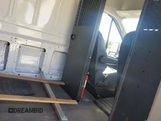 2021 Ford Transit Cargo z VIN 1FTBR1X85MKA45784, wystawiony jako Copart lot #58608665 z przebiegiem 65 342 mil mil oraz Szkody całkowita. Historia ofert i sprzedaży dostępna na DreamBid. Obrazek 11.