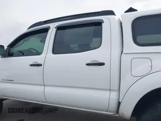 2009 Toyota Tacoma PreRunner with VIN 3TMJU62N49M076433, listed as a IAAI auction lot 41902369 with 164,827 mi miles. Bid and sale history available at carsss.com. Image 14.
