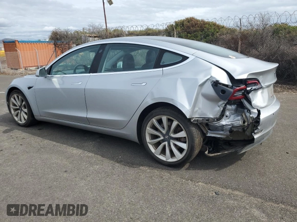 2018 Tesla Model 3 Long Range Battery with VIN 5YJ3E1EB8JF091116, listed as a Copart auction lot 43281485 with 58,677 mi miles and Salvage Title. Bid and sale history available at DreamBid. Image 2.
