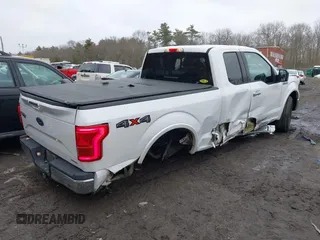 2015 Ford F-150 XLT with VIN 1FTFX1EF5FKD23434, listed as a IAAI auction lot 41613023 with 151,905 mi miles and . Bid and sale history available at DreamBid. Image 4.