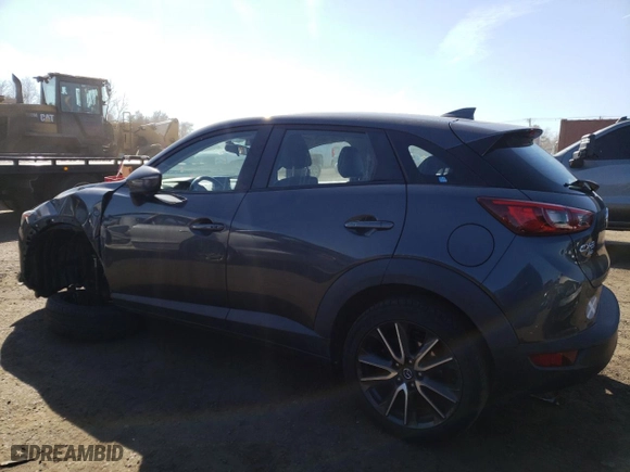 2017 Mazda CX-3 Touring with VIN JM1DKFC79H0163216, listed as a Copart auction lot 47012165 with 102,889 mi miles and Salvage Title. Bid and sale history available at carsss.com. Image 2.