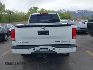2014 Nissan Titan Pro-4X with VIN 1N6BA0ECXEN501915, listed as a IAAI auction lot 42097967 with 120,851 mi miles and . Bid and sale history available at DreamBid. Image 16.