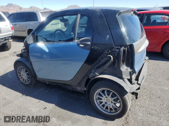 2011 Smart fortwo Pure z VIN WMEEJ3BA2BK427313, wystawiony jako Copart lot #46875525 z przebiegiem 90 435 mil mil oraz Szkoda całkowita • Salvage title. Historia ofert i sprzedaży dostępna na DreamBid. Obrazek 2.