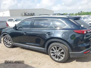 2017 Mazda CX-9 Grand Touring with VIN JM3TCADY5H0129798, listed as a IAAI auction lot 42079754 with 128,403 mi miles and . Bid and sale history available at DreamBid. Image 15.