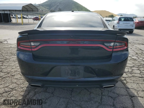2021 Dodge Charger SXT with VIN 2C3CDXBG9MH682354, listed as a Copart auction lot 48586415 with 112,449 mi miles and Salvage Title. Bid and sale history available at carsss.com. Image 6.