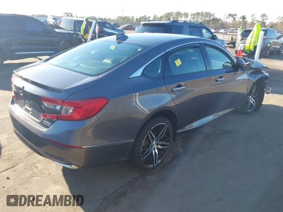 2022 Honda Accord Touring with VIN 1HGCV3F96NA011657, listed as a IAAI auction lot 41701375 with 13,681 mi miles and . Bid and sale history available at DreamBid. Image 4.