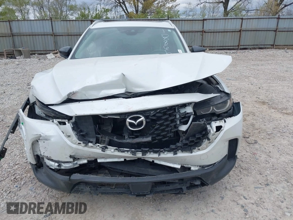 2023 Mazda CX-50 S Premium Plus with VIN 7MMVABEM7PN108865, listed as a IAAI auction lot 42049215 with 33,285 mi miles and . Bid and sale history available at DreamBid. Image 6.
