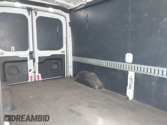 2018 Ford Transit with VIN 1FTBW2CM2JKA88329, listed as a IAAI auction lot 41768071 with 76,796 mi miles and . Bid and sale history available at DreamBid. Image 8.