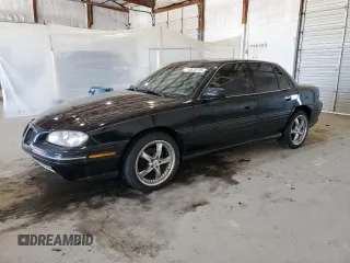 1996 Pontiac Grand Am SE z VIN 1G2NE52T8TC744741, wystawiony jako Copart lot #53675115 z przebiegiem 43 768 mil mil oraz Czysty tytuł • Clean title. Historia ofert i sprzedaży dostępna na DreamBid. Obrazek 1.