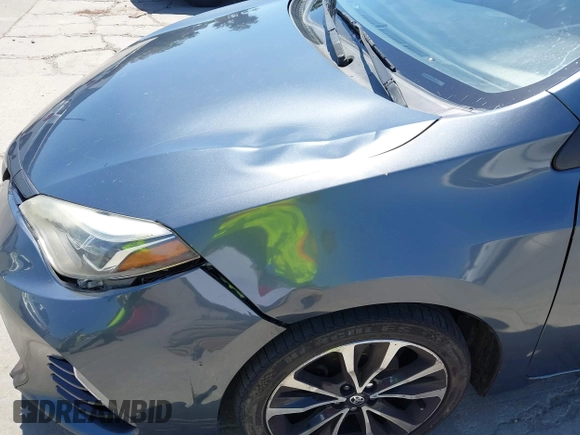 2017 Toyota Corolla L with VIN 5YFBURHE6HP575352, listed as a IAAI auction lot 42417810 with 248,626 mi miles and . Bid and sale history available at DreamBid. Image 17.