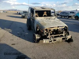 2009 Jeep Wrangler Rubicon with VIN 1J4GA64119L762714, listed as a Copart auction lot 80943364 with Not Provided miles and Salvage Title. Bid and sale history available at DreamBid. Image 12.