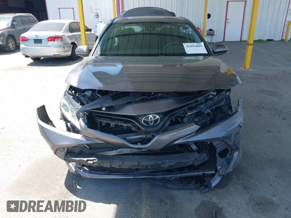 2019 Toyota Camry LE with VIN 4T1B11HK8KU204599, listed as a IAAI auction lot 42096889 with 76,518 mi miles and . Bid and sale history available at DreamBid. Image 13.