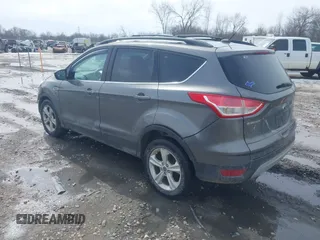 2014 Ford Escape SE with VIN 1FMCU9GX0EUA37649, listed as a IAAI auction lot 41834356 with 189,953 mi miles. Bid and sale history available at carsss.com. Image 3.
