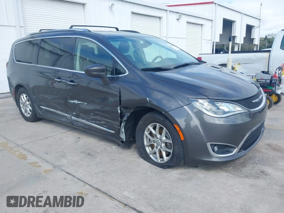 2020 Chrysler Pacifica Touring L z VIN 2C4RC1BG7LR284994, wystawiony jako IAAI lot #41661416 z przebiegiem 101 257 mil mil oraz . Historia ofert i sprzedaży dostępna na DreamBid. Obrazek 1.