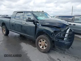 2013 Ram 2500 z VIN 3C6TR5MT8DG563651, wystawiony jako IAAI lot #41085616 z przebiegiem Nie podano mil oraz . Historia ofert i sprzedaży dostępna na DreamBid. Obrazek 1.
