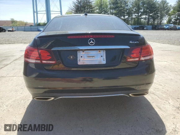 2015 Mercedes-Benz E 400 with VIN WDDKJ6HB2FF303744, listed as a Copart auction lot 55131245 with 84,714 mi miles and Salvage Title. Bid and sale history available at DreamBid. Image 6.