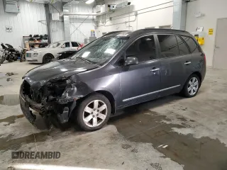 2008 Kia Rondo LX Base with VIN KNAFG525287212765, listed as a Copart auction lot 87700005 with 286,337 mi miles and Salvage Title. Bid and sale history available at carsss.com. Image 1.