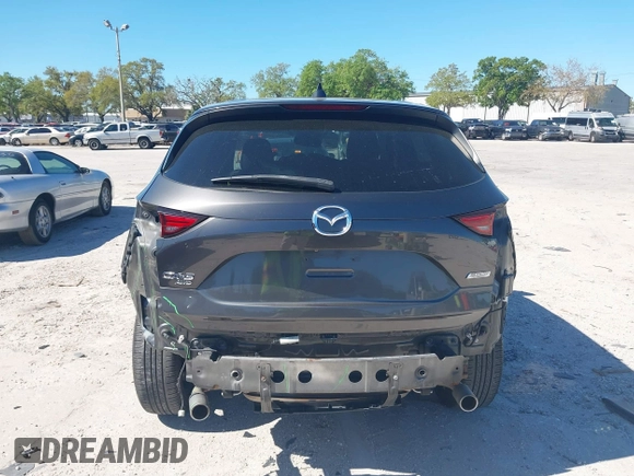 2018 Mazda CX-5 Grand Touring with VIN JM3KFBDM8J0314925, listed as a IAAI auction lot 41825917 with 70,027 mi miles. Bid and sale history available at carsss.com. Image 17.