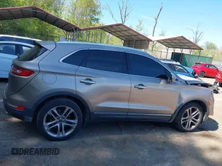 2019 Lincoln MKC Reserve with VIN 5LMCJ3D93KUL53163, listed as a IAAI auction lot 42097105 with 71,066 mi miles and . Bid and sale history available at DreamBid. Image 13.