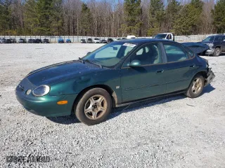 1999 Ford Taurus SE with VIN 1FAFP53S0XA102036, listed as a Copart auction lot 43810035 with 228,136 mi miles and Salvage Title. Bid and sale history available at carsss.com. Image 1.