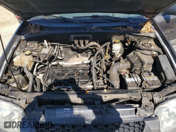2005 Ford Escape XLS Value с VIN 1FMYU92Z75KB68457, выставлен на аукционе Copart как лот 46427005 с пробегом 144 278 миль миль и Списание • Salvage title. История ставок и продаж доступна на DreamBid. Изображение 13.