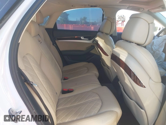 2013 Audi A8 4.0L with VIN WAUA2AFD9DN017867, listed as a IAAI auction lot 40430651 with 114,928 mi miles and . Bid and sale history available at DreamBid. Image 8.