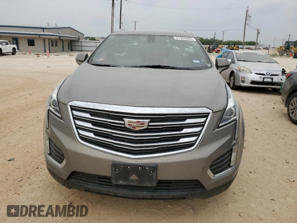 2019 Cadillac XT5 FWD with VIN 1GYKNARS9KZ107402, listed as a Copart auction lot 51352805 with 94,147 mi miles and Clean title. Bid and sale history available at DreamBid. Image 5.