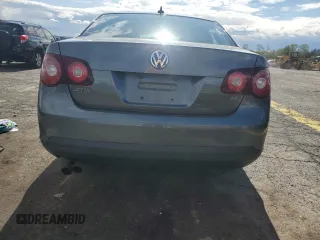 2009 Volkswagen Jetta SE with VIN 3VWRZ71K79M168084, listed as a Copart auction lot 57854825 with 150,986 mi miles and Salvage title. Bid and sale history available at DreamBid. Image 6.