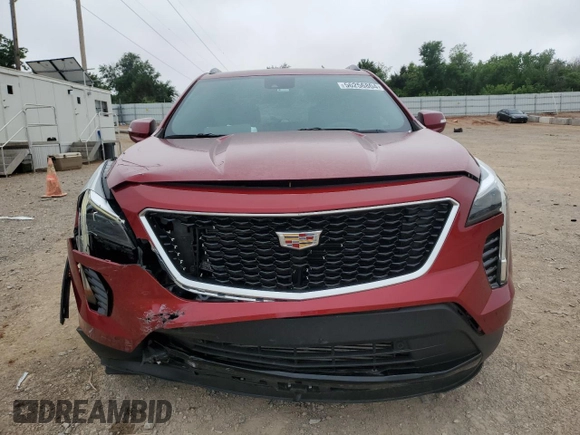 2021 Cadillac XT4 FWD Sport with VIN 1GYFZER49MF082391, listed as a Copart auction lot 56256804 with 24,415 mi miles and Salvage Title. Bid and sale history available at DreamBid. Image 5.