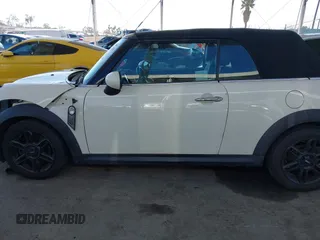 2014 MINI Convertible S with VIN WMWZP3C5XET706911, listed as a IAAI auction lot 42217410 with 54,649 mi miles and . Bid and sale history available at DreamBid. Image 14.