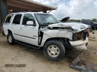 2005 GMC Yukon SLT with VIN 1GKEC13Z45J204402, listed as a Copart auction lot 51697595 with 242,881 mi miles and Salvage Title. Bid and sale history available at carsss.com. Image 4.