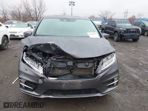 2019 Honda Odyssey Elite with VIN 5FNRL6H91KB048535, listed as a IAAI auction lot 40906579 with 37,322 mi miles and . Bid and sale history available at DreamBid. Image 12.