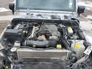 2018 Jeep Wrangler Unlimited Sahara with VIN 1C4HJWEG5JL930372, listed as a Copart auction lot 50772625 with 91,528 mi miles and Salvage title. Bid and sale history available at DreamBid. Image 12.