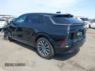 2024 Cadillac LYRIQ Sport z VIN 1GYKPVRK6RZ131099, wystawiony jako IAAI lot #41979330 z przebiegiem 3953 mil mil oraz . Historia ofert i sprzedaży dostępna na DreamBid. Obrazek 3.