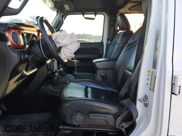 2018 Jeep Wrangler Unlimited Rubicon with VIN 1C4HJXFG8JW104425, listed as a Copart auction lot 87545965 with 62,988 mi miles and Salvage title. Bid and sale history available at DreamBid. Image 7.