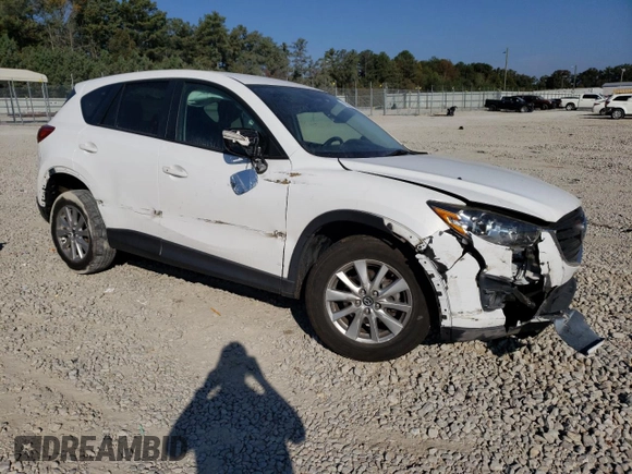 2016 Mazda CX-5 Touring with VIN JM3KE2CY6G0896040, listed as a Copart auction lot 78399684 with 98,639 mi miles and Salvage Title. Bid and sale history available at DreamBid. Image 4.