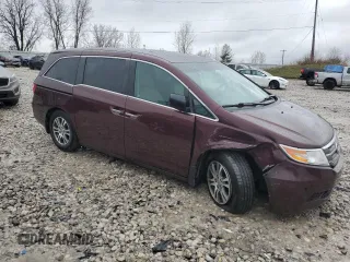 2012 Honda Odyssey EX-L with VIN 5FNRL5H61CB019702, listed as a Copart auction lot 51535585 with 185,737 mi miles and Clean Title. Bid and sale history available at DreamBid. Image 4.