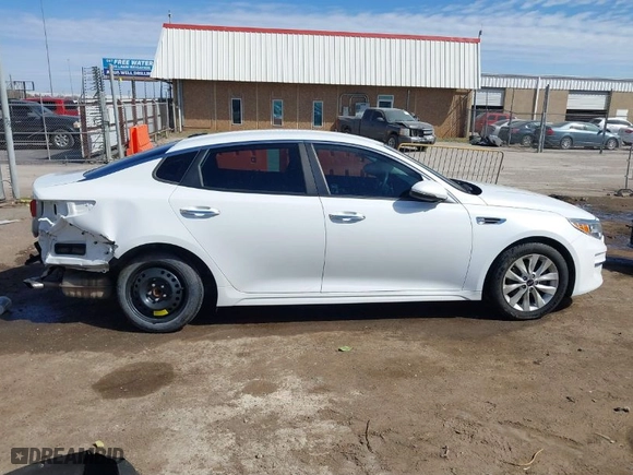 2016 Kia Optima LX with VIN 5XXGT4L30GG019255, listed as a IAAI auction lot 41870147 with 119,265 mi miles. Bid and sale history available at carsss.com. Image 14.