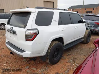2022 Toyota 4Runner TRD Off Road with VIN JTEPU5JRXN6042348, listed as a IAAI auction lot 41734665 with 55,725 mi miles. Bid and sale history available at carsss.com. Image 4.