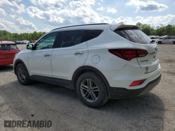2017 Hyundai Santa Fe 2.4L z VIN 5XYZUDLB7HG388382, wystawiony jako Copart lot #57167315 z przebiegiem 128 724 mil mil oraz Szkoda całkowita • Salvage title. Historia ofert i sprzedaży dostępna na DreamBid. Obrazek 2.