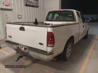 2001 Ford F-150 XL with VIN 1FTPX17L31NB27121, listed as a IAAI auction lot 41169060 with 247,389 mi miles and . Bid and sale history available at DreamBid. Image 4.