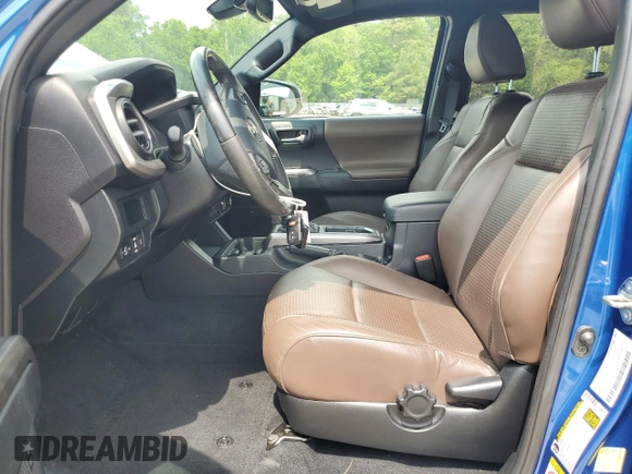 2018 Toyota Tacoma SR z VIN 3TMGZ5AN5JM148719, wystawiony jako Copart lot #56621065 z przebiegiem 34 433 mil mil oraz Szkoda całkowita • Salvage title. Historia ofert i sprzedaży dostępna na DreamBid. Obrazek 7.