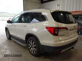 2019 Honda Pilot EX-L with VIN 5FNYF6H54KB043295, listed as a IAAI auction lot 42298547 with 235,343 mi miles and . Bid and sale history available at DreamBid. Image 3.