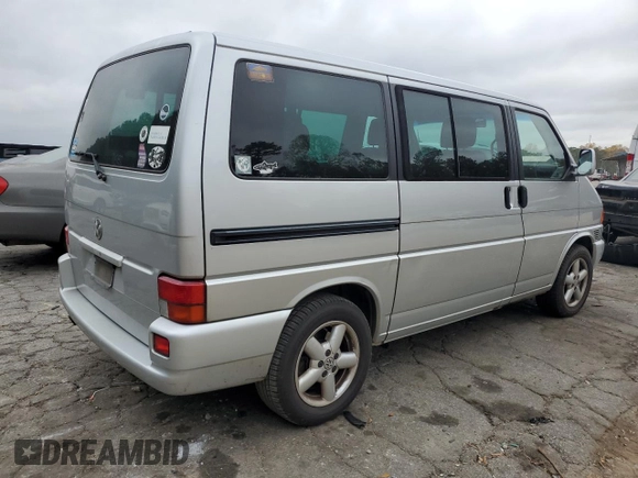 2002 Volkswagen EuroVan с VIN WV2KB47022H065941, выставлен на аукционе Copart как лот 79238234 с пробегом Не указан миль и Чистый • Clean title. История ставок и продаж доступна на DreamBid. Изображение 3.