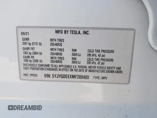 2021 Tesla Model Y Long Range with VIN 5YJYGDEEXMF280480, listed as a IAAI auction lot 41993633 with 69,579 mi miles. Bid and sale history available at carsss.com. Image 9.