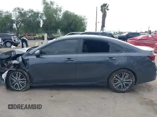 2023 Kia Forte GT-Line z VIN 3KPF54ADXPE598362, wystawiony jako IAAI lot #41857738 z przebiegiem 64 208 mil mil oraz . Historia ofert i sprzedaży dostępna na DreamBid. Obrazek 13.