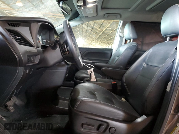 2017 Toyota Sienna SE with VIN 5TDXZ3DC7HS785250, listed as a Copart auction lot 57009695 with 79,691 mi miles and Salvage title. Bid and sale history available at DreamBid. Image 7.